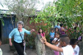 Bea Bowersmith dancing with local kids in Nicaragua – Best Places In The World To Retire – International Living